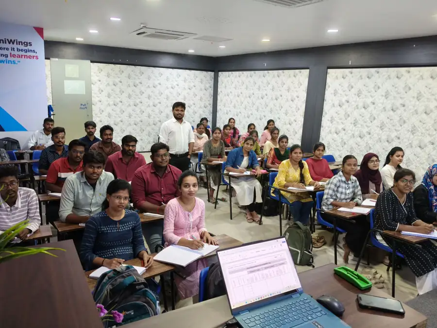 CliniWings medical students in lab coats during training session